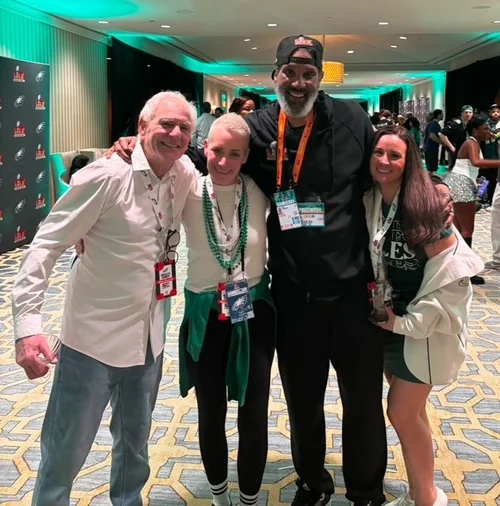 Dr. Cohen pictured with Paul Lancaster, Philadelphia Eagles Director of Player Engagement & family